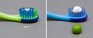 Side-by-side photos of a rice-sized amount of toothpaste on a toothbrush and a pea-sized amount of toothpaste on a toothbrush with single rice grain and green pea for reference