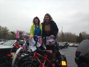 Dropping gifts off for the practice's adopted family for Christmas 2014