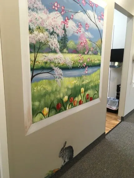 {PRACTICE_NAME} Harleysville office hallway with colorful artwork