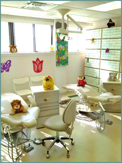 {PRACTICE_NAME} Lansdale office Orthodontic Bay with patient examination chairs and colorful decorations