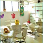 {PRACTICE_NAME} Lansdale office Orthodontic Bay with patient examination chairs and colorful decorations