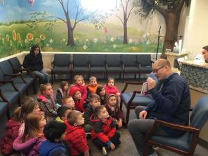Dr. Kwon speaking to the kids at the Indian Valley YMCA during Dental Health Month