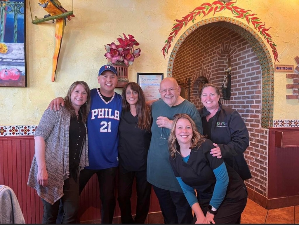 {PRACTICE NAME} staff group photo 