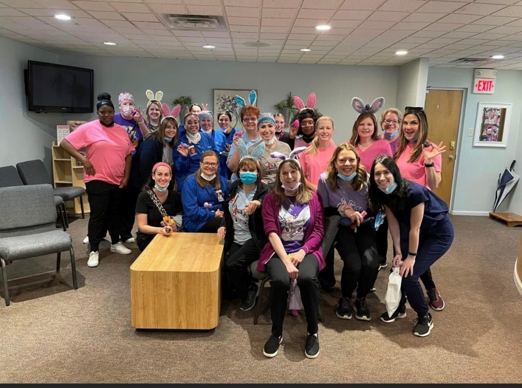 {PRACTICE NAME} staff group photo 
