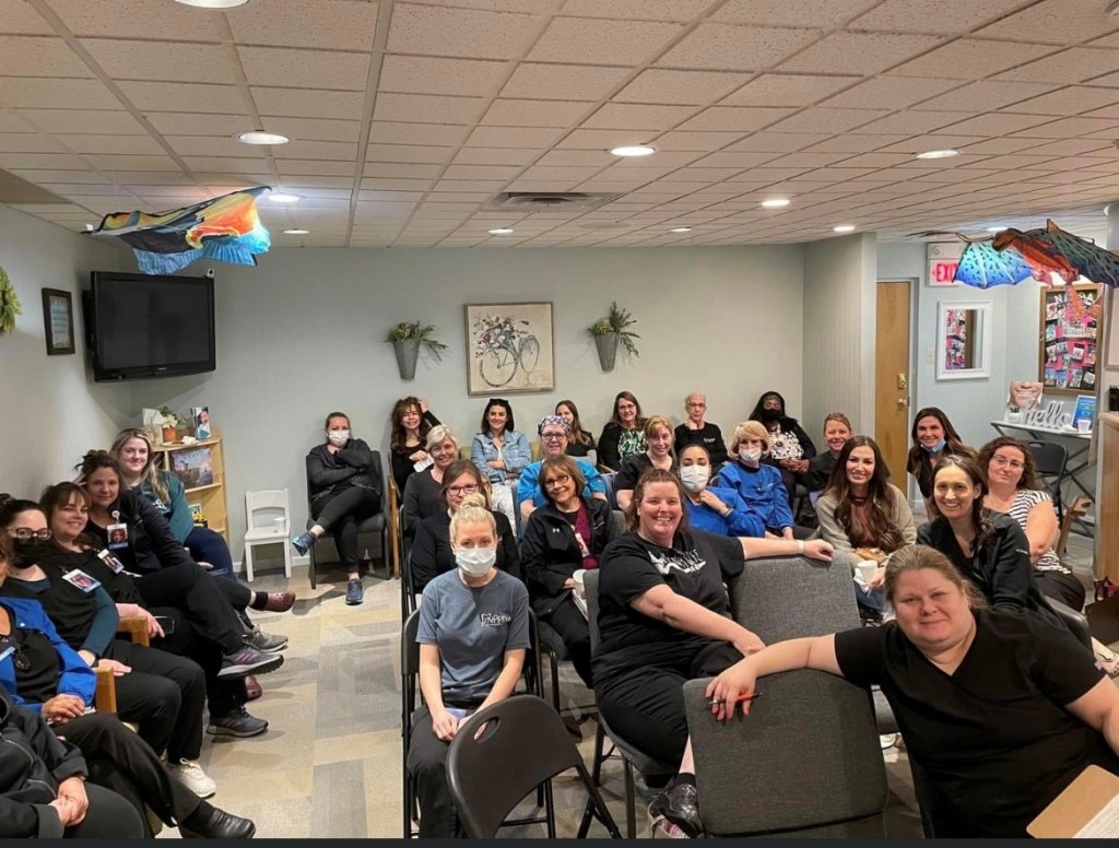 {PRACTICE NAME} staff group photo 